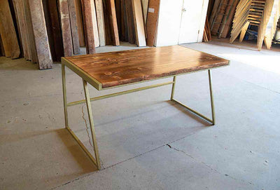 Elegant wooden table with sturdy, thin legs