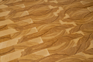 Close-up of handcrafted sustainable solid wood surface with natural wood grain patterns on a chopping block table