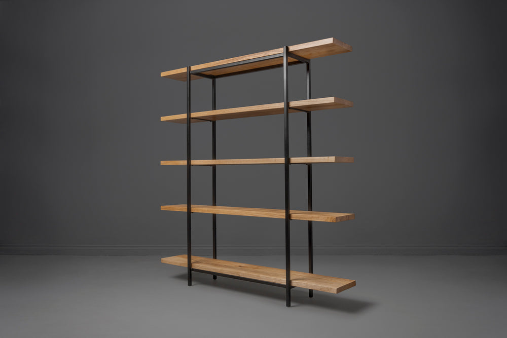 Handcrafted sustainable solid wood bookshelf with sleek metal frame, combining custom woodworking and modern design.