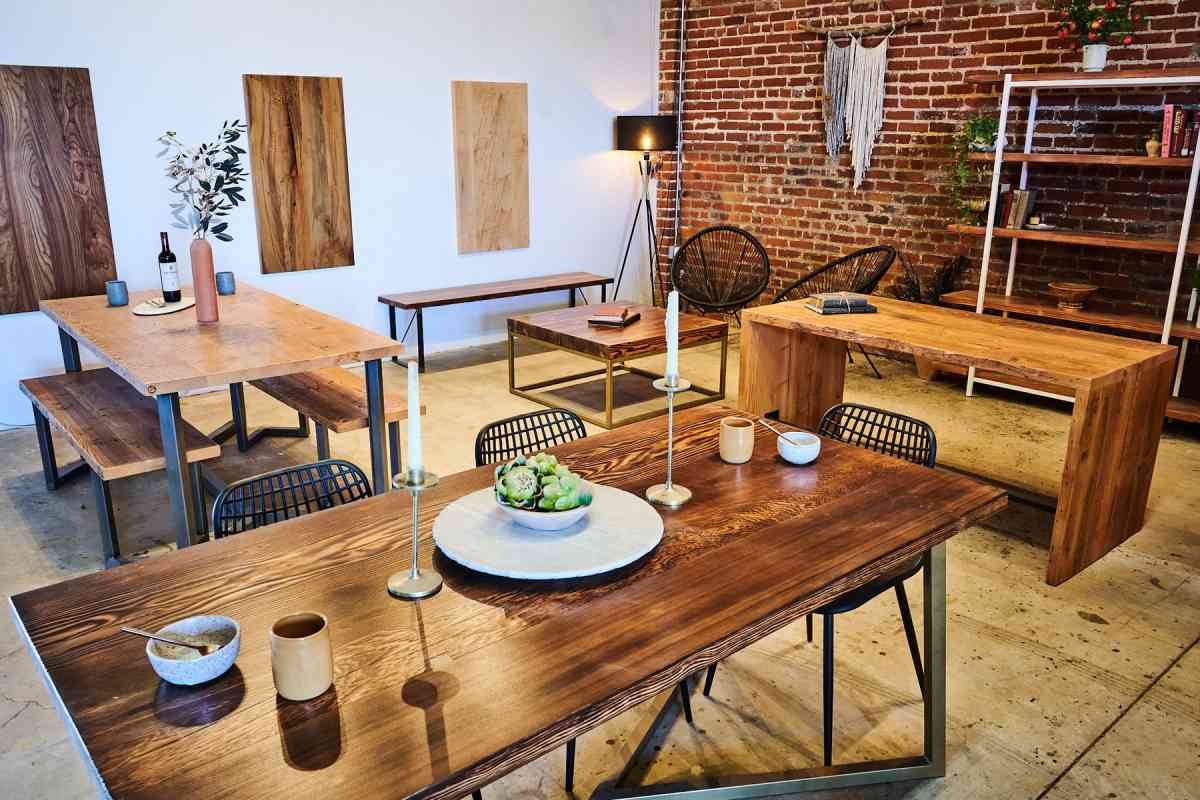 Wooden tables and wooden chairs with black metal legs and frames