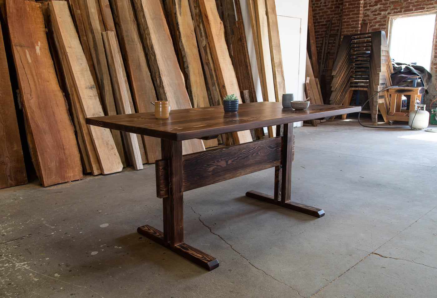 Handcrafted natural wood dining table with rectangular top and custom dimensions