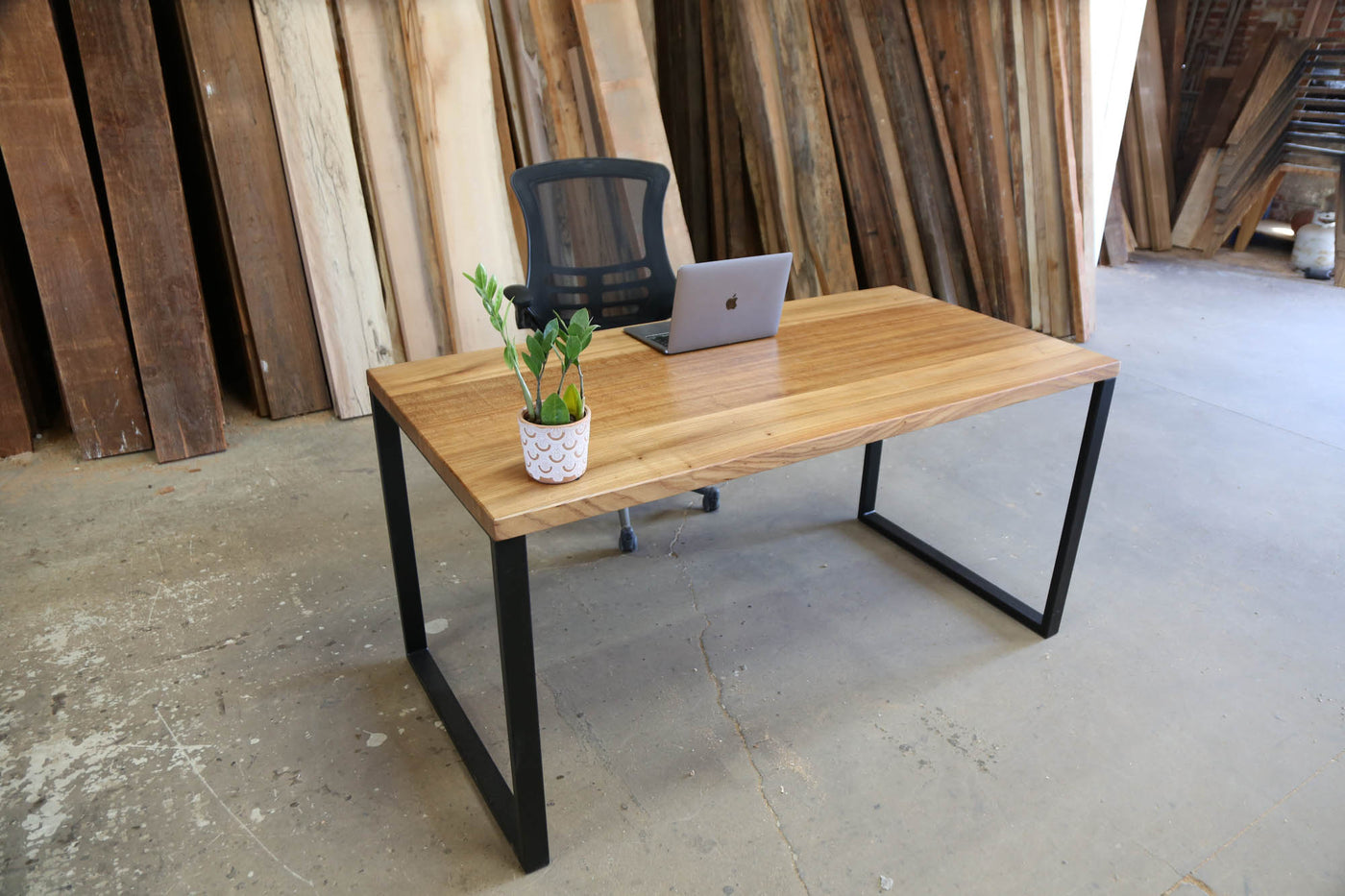 Modern wooden desk with metal leg frame