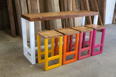 Wooden table and chairs with various wooden base colors